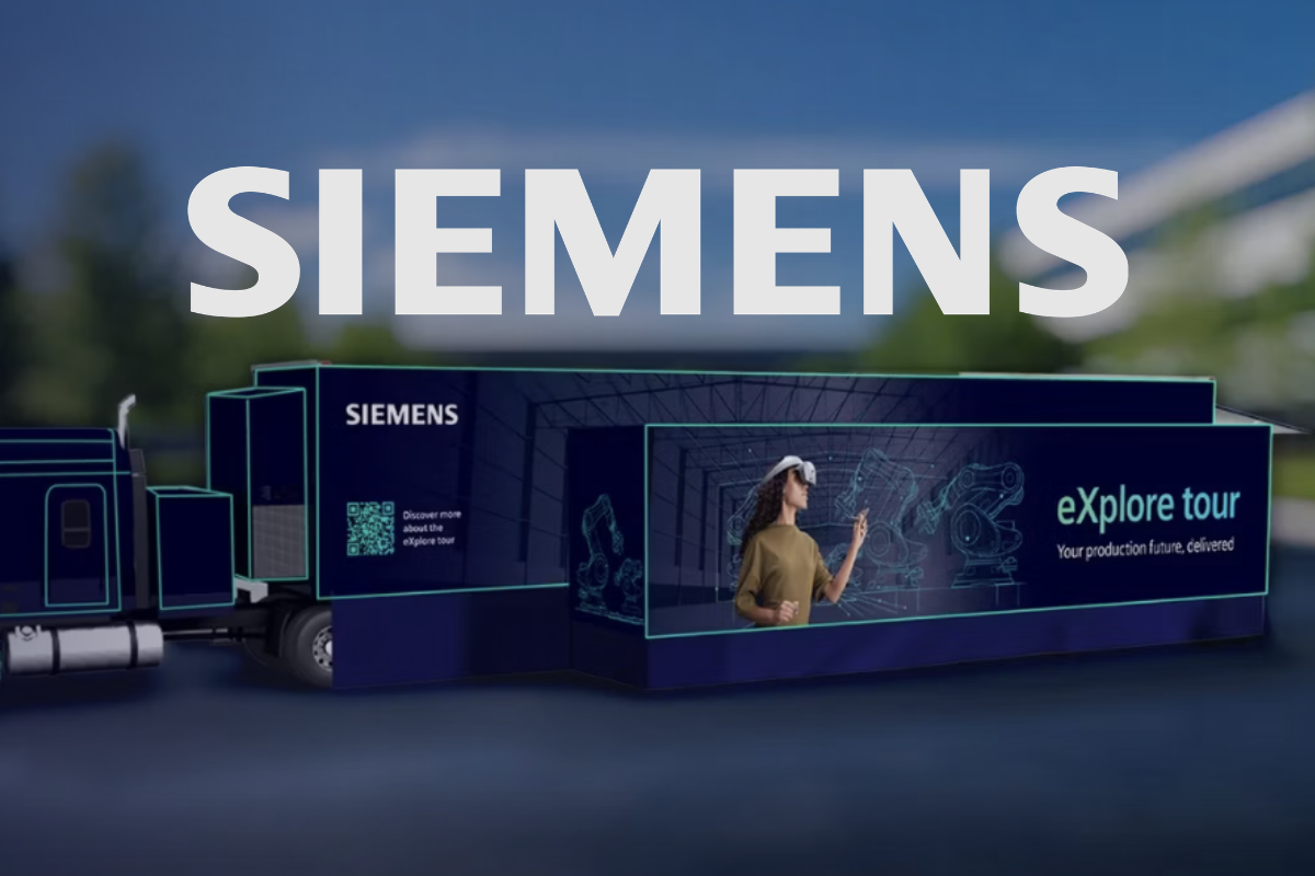 Siemens eXplore tour mobile exhibit trailer with its side expanded for visitors.